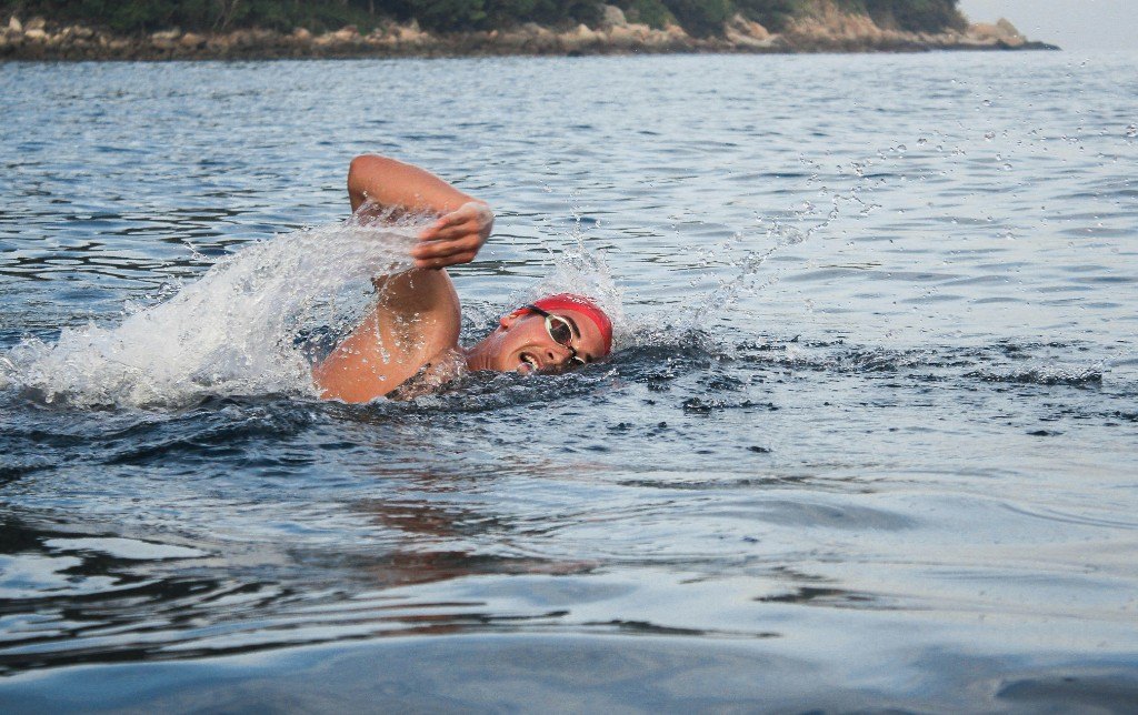 Open-water swimmer mid-stroke